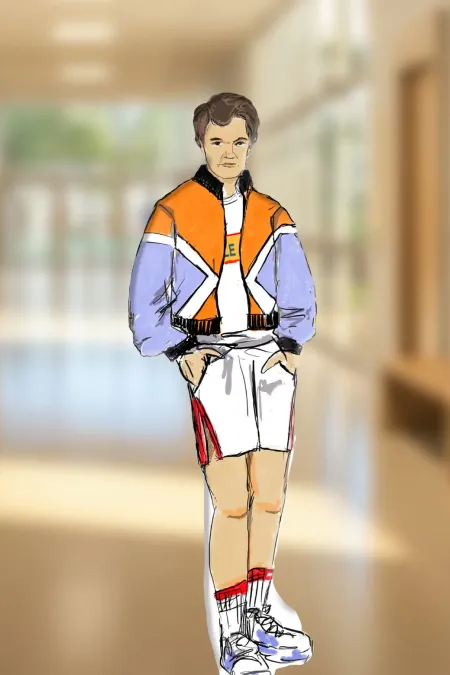 © Tinde Lappalainen Person steht in einem Flur und trägt eine Jacke mit orangefarbenen und lilafarbenen Ärmeln, weiße Shorts mit roten Streifen und weiße Sportschuhe